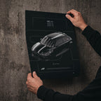 Audi S1 2015 poster print held in hands against a concrete wall