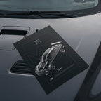 BMW M3 E46 GTR 2004 poster resting on a car hood