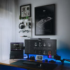 Cadillac Series 62 1949 framed poster on a modern desk setup