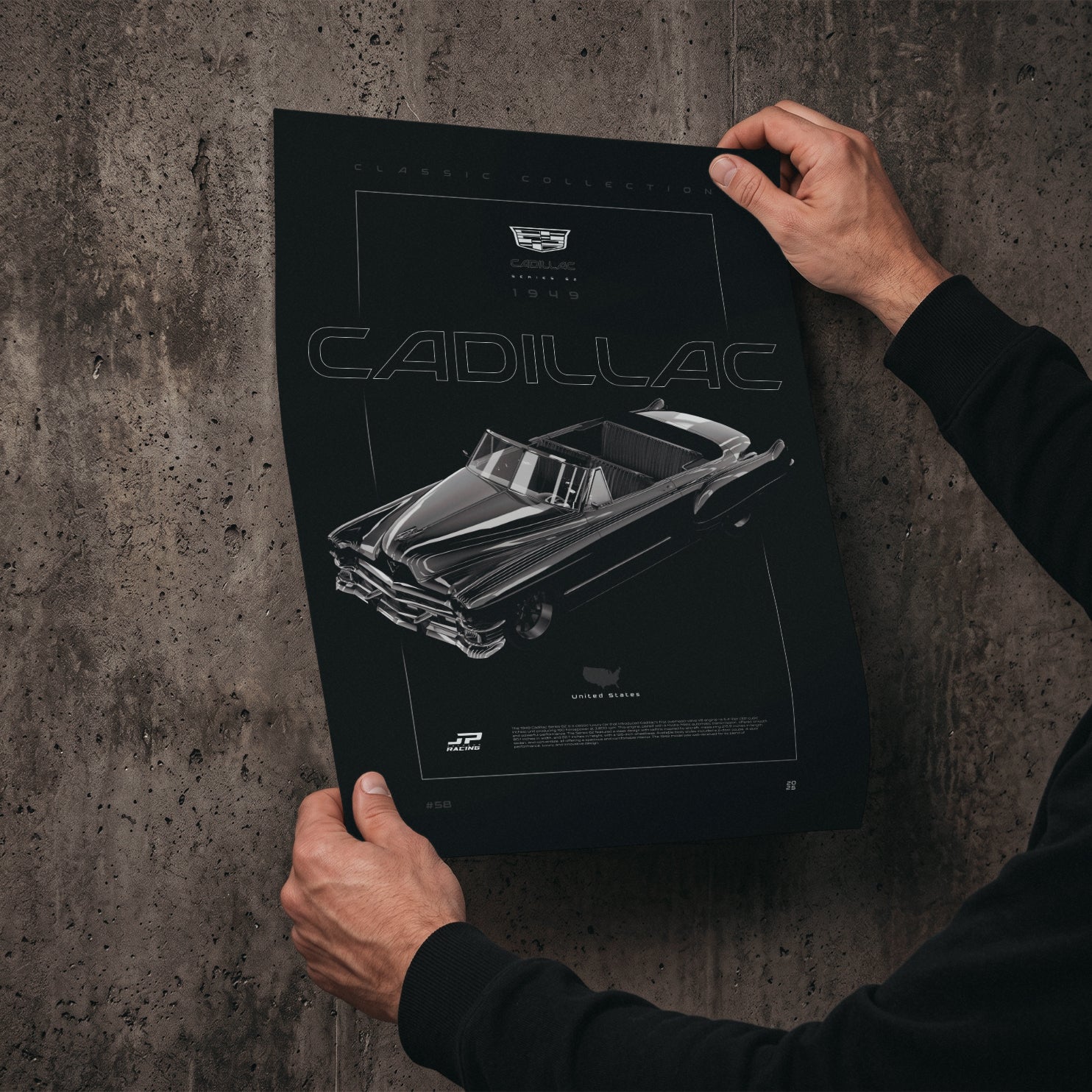 Cadillac Series 62 1949 poster print held in hands against a concrete wall