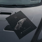 Chevrolet Chevelle SS 1970 poster resting on a car hood