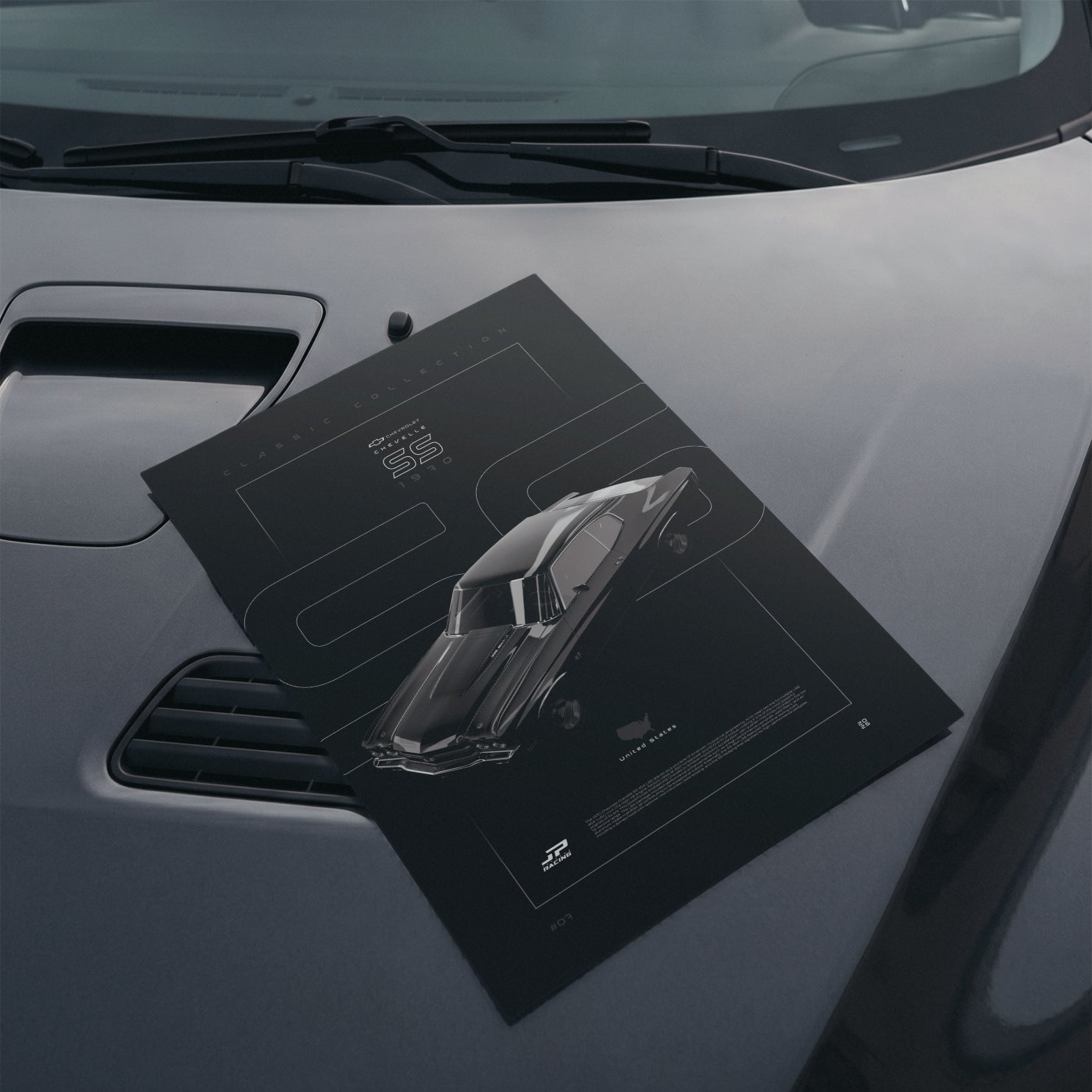 Chevrolet Chevelle SS 1970 poster resting on a car hood