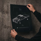 Chevrolet LUV 1979 poster print held in hands against a concrete wall