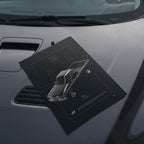 Chevrolet LUV 1979 poster resting on a car hood