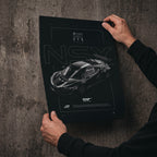 Honda NSX GT3 Evo 2019 poster print held in hands against a concrete wall