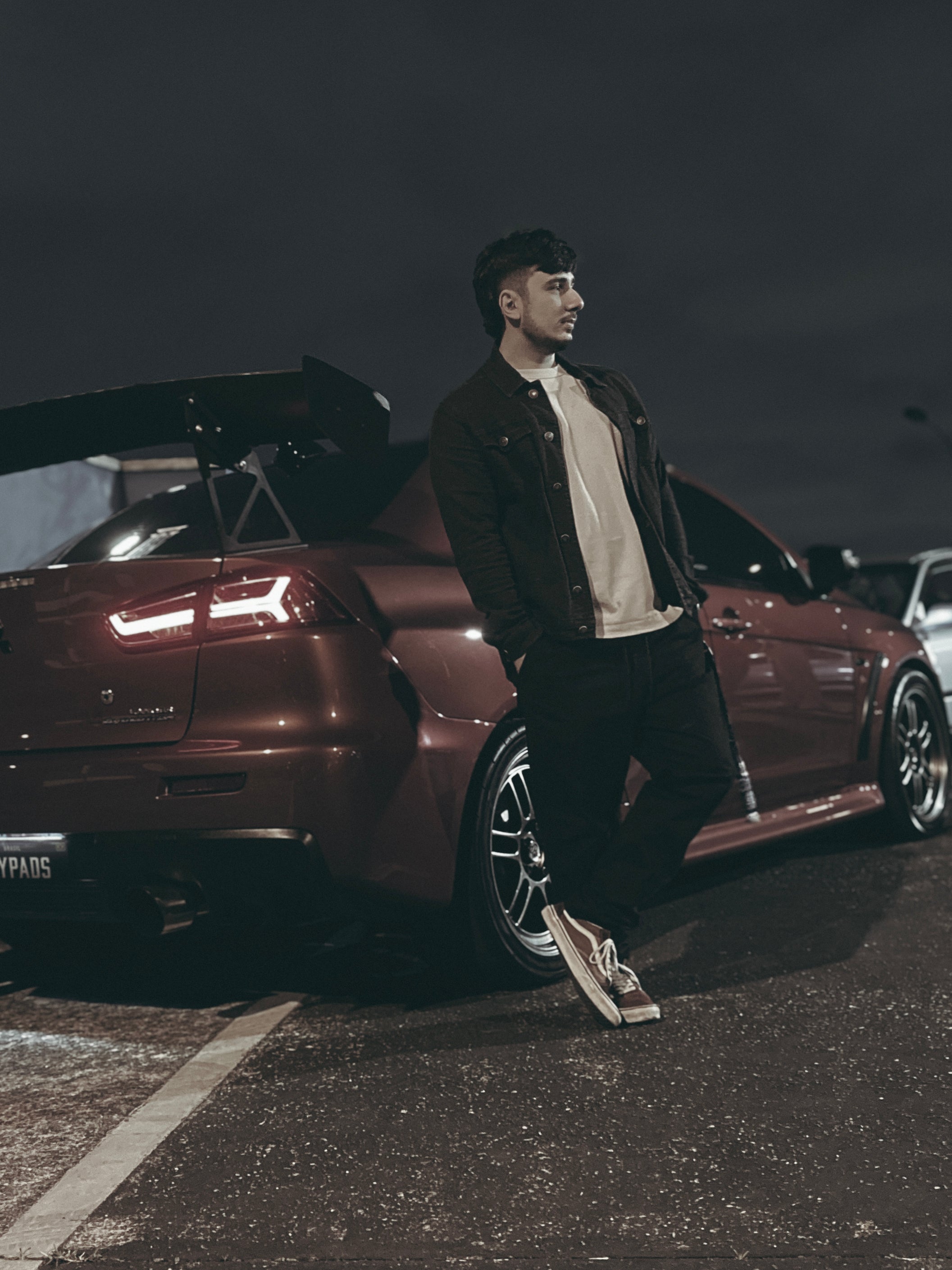 Jean with a Mitsubishi Lancer Evolution