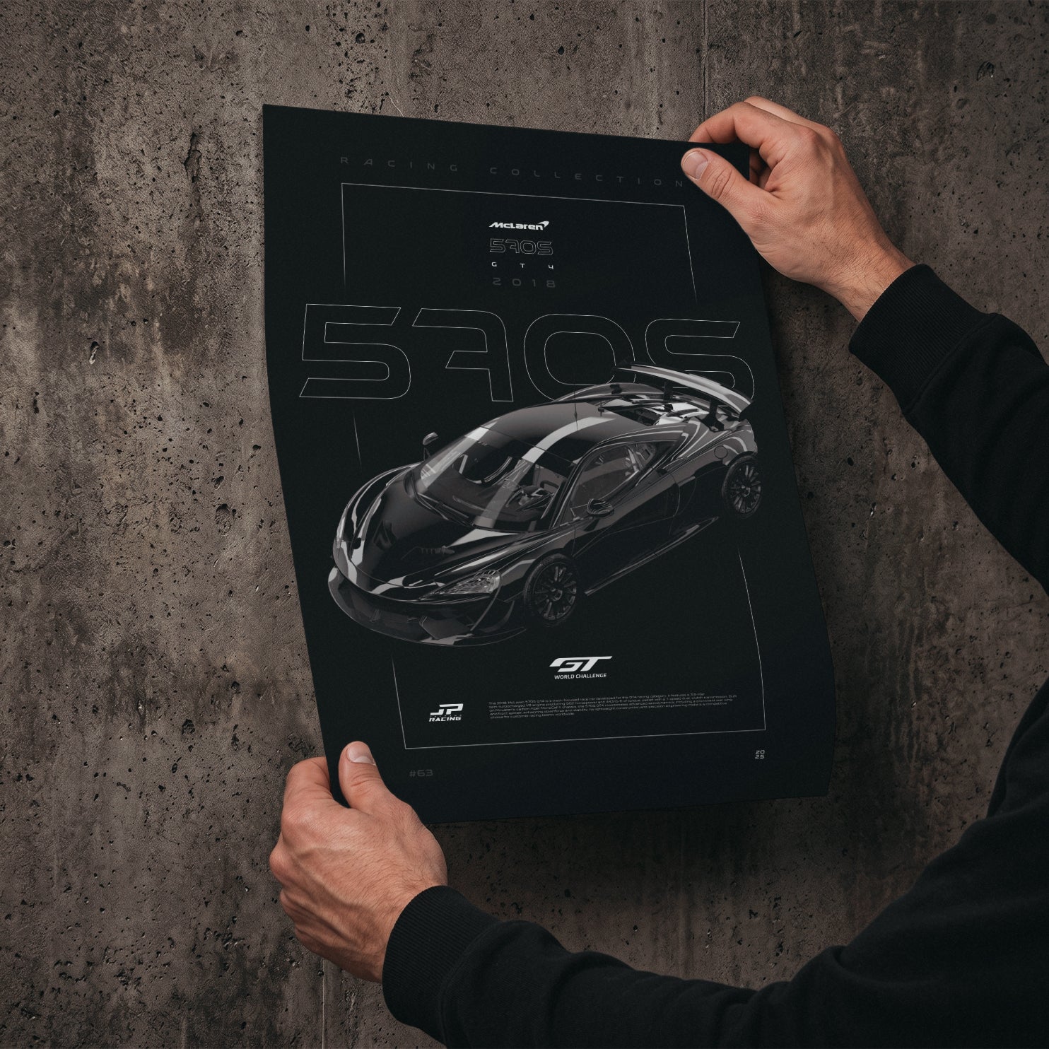 McLaren 570S GT4 2018 poster print held in hands against a concrete wall