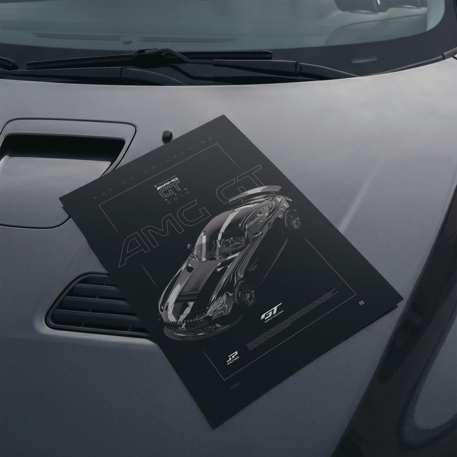 Mercedes AMG GT4 2019 poster resting on a car hood