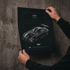 Mercedes-Benz AMG GT GT3 2020 poster print held in hands against a concrete wall