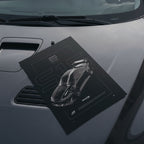 Nissan Silvia S15 1999 poster resting on a car hood
