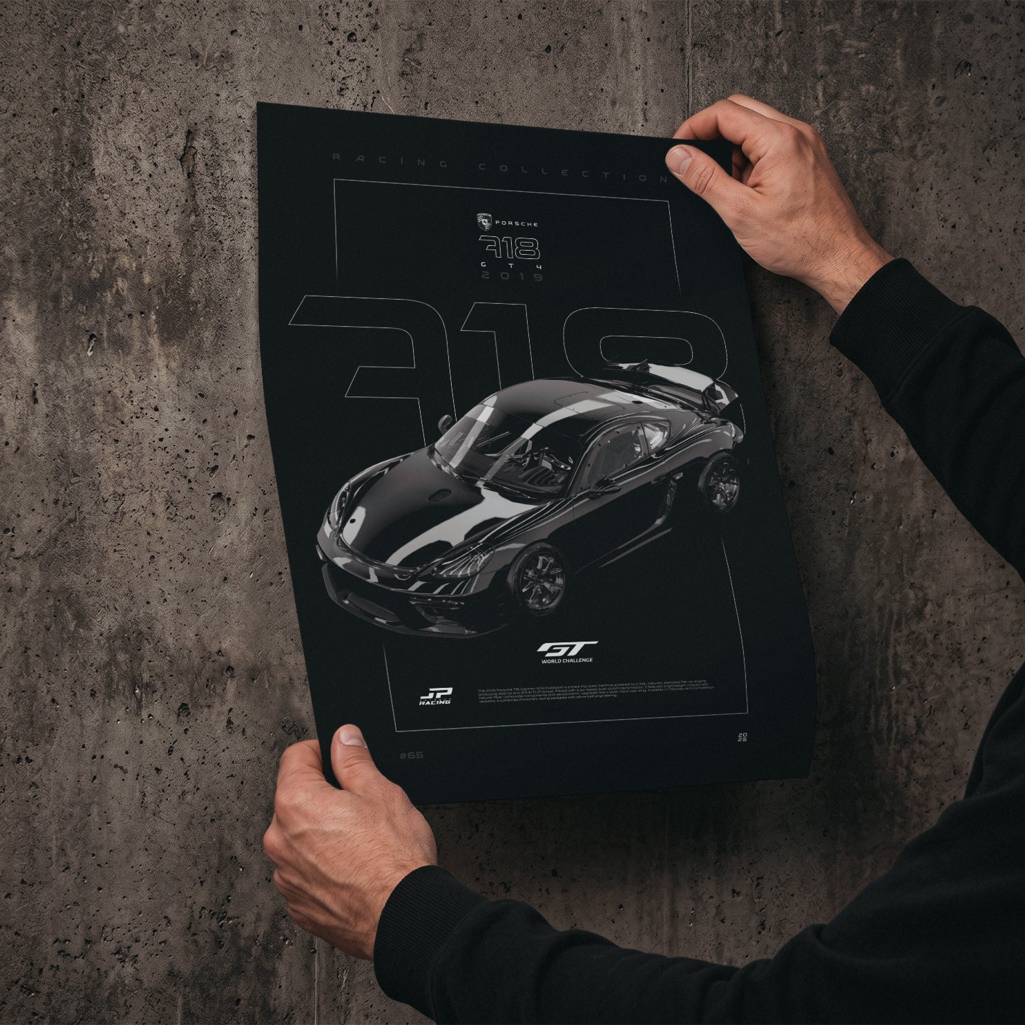 Porsche 718 Cayman GT4 Clubsport 2019 poster print held in hands against a concrete wall