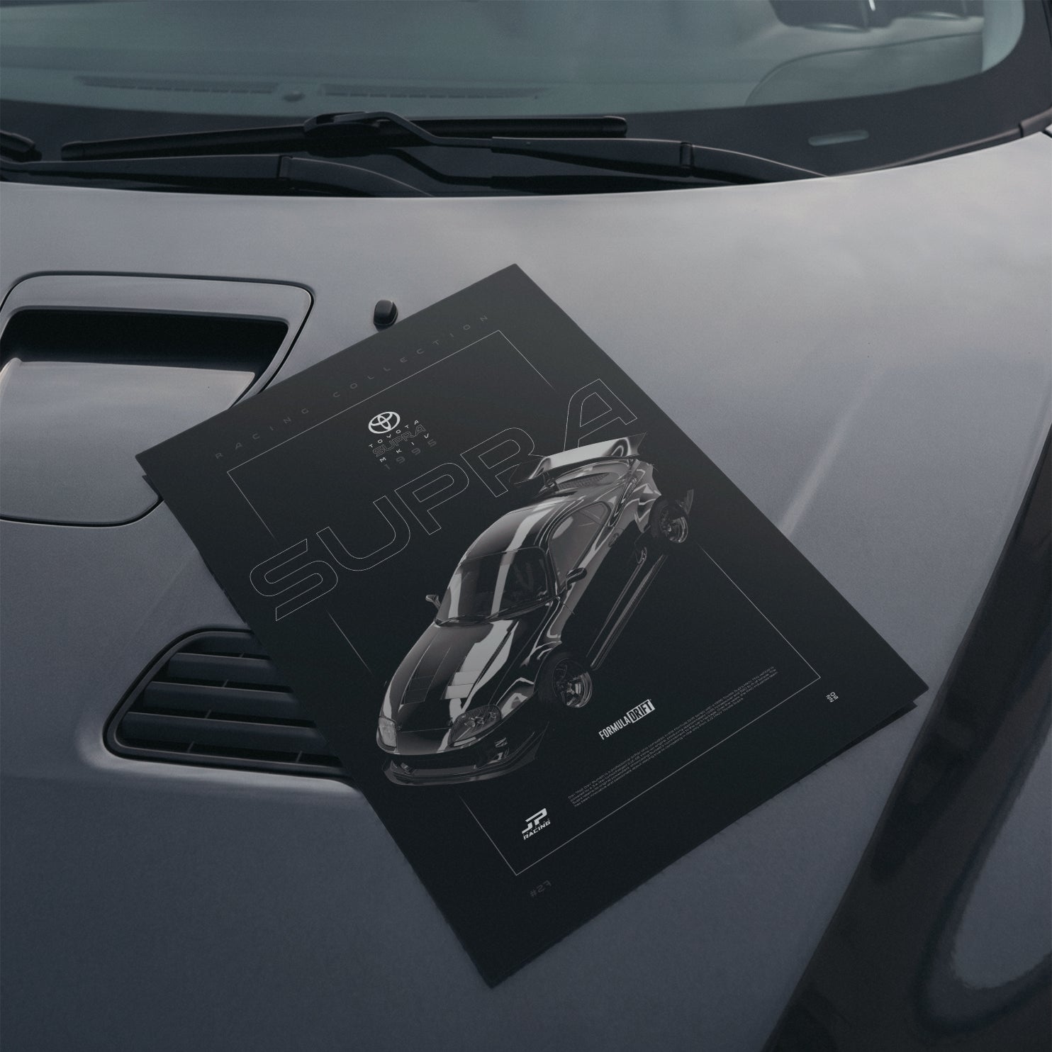 Toyota Supra MKIV FD 1995 poster resting on a car hood