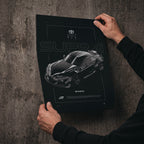 Toyota Supra MKV D1 2019 poster print held in hands against a concrete wall